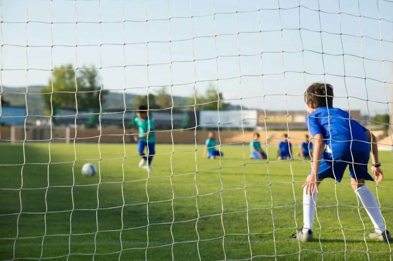 Kids enjoying a soccer match